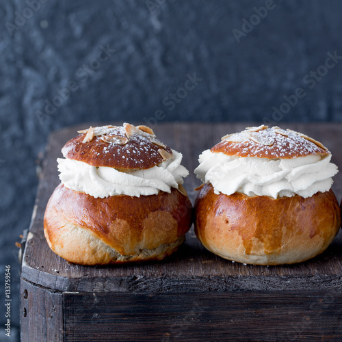 Fresh baked homemade buns on the table for breakfast Baking traditional Swedish semla bread