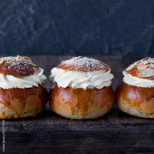 Fresh baked homemade buns on the table for breakfast Baking traditional Swedish semla bread