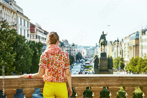 woman on Vaclavske namesti in Prague Czech Republic looking photo
