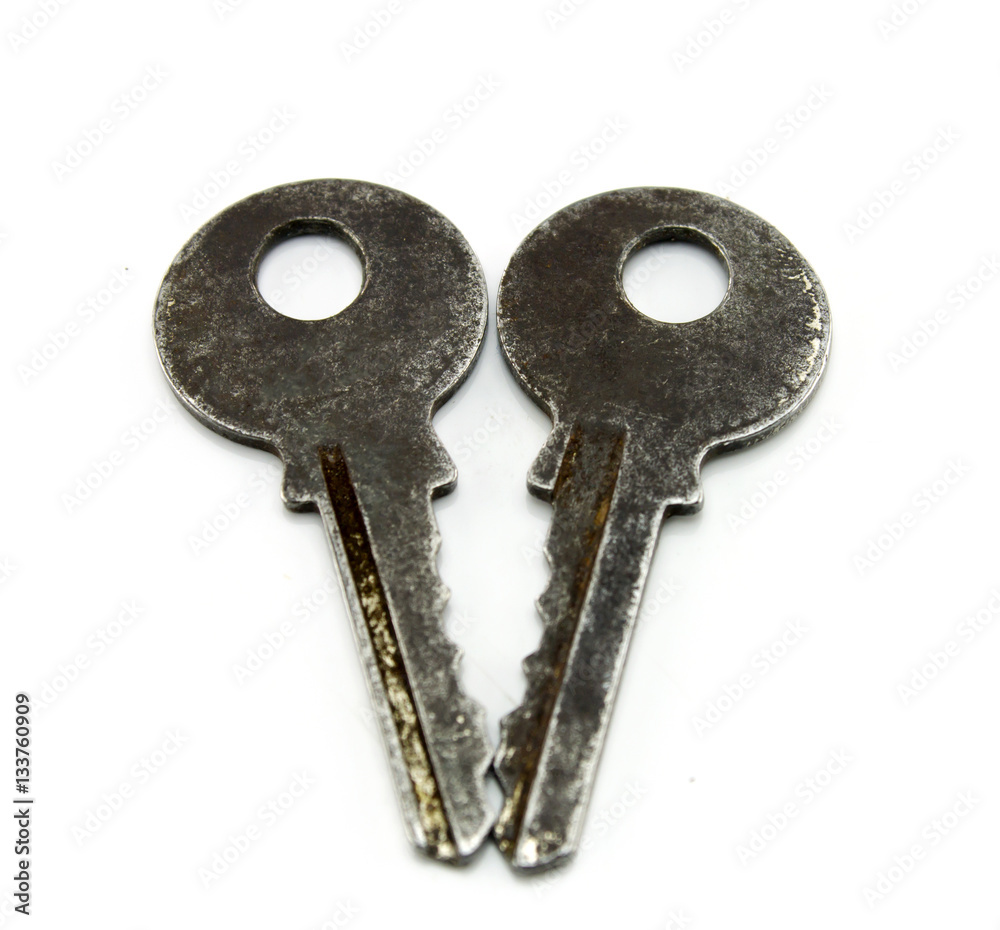 Old key isolated on white background Old key isolated on white background