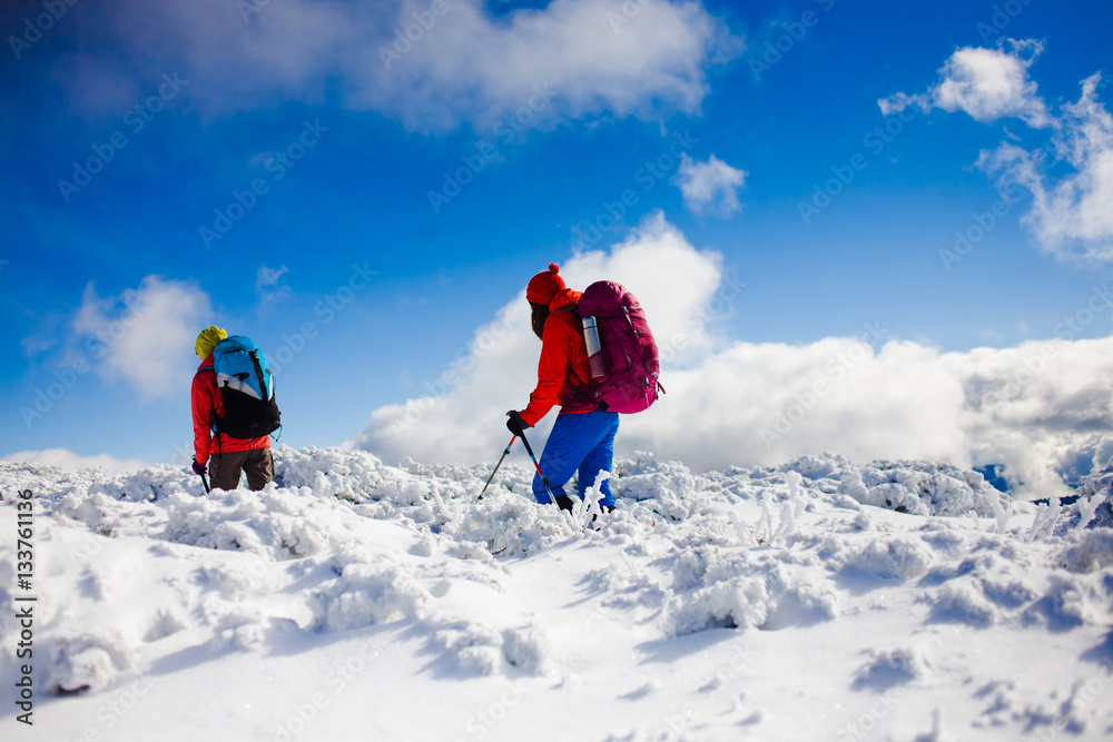 Climbers are on snow.