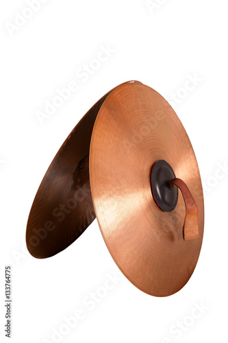 Close up of an prcussion cymbals with leather handle  isolated on background. photo