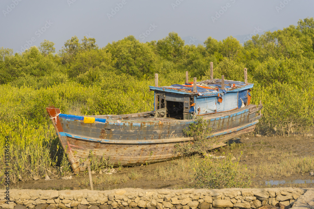 The ship ran aground on the beach after the storm, Burma The ship ran aground on the beach after the storm, Burma