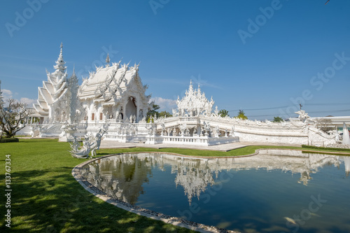 The Buddhist Wat Rong Khun or white temple in Chiang Rai norther © Pixelatelier.at