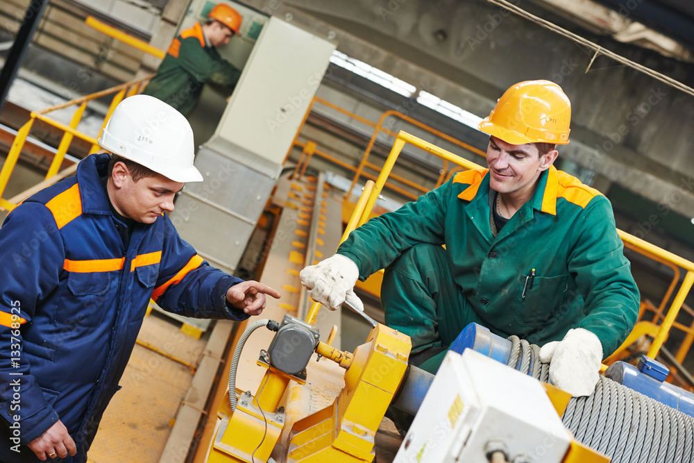 industry worker repairman with spanner industry worker repairman with spanner
