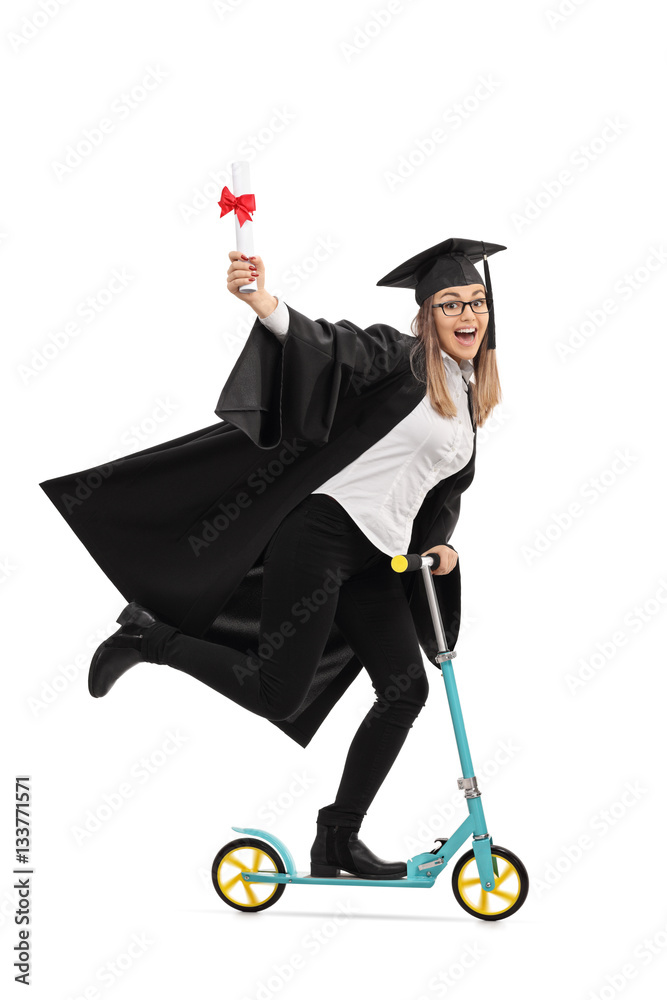 Fototapeta premium Overjoyed graduate student holding a diploma and riding a scoote
