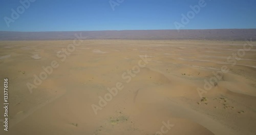 Aerial, Flying Over Sahara Dunes, Erg Chegaga, Morocco - Native Material, straight out of the cam, watch also for the graded and stabilized version photo