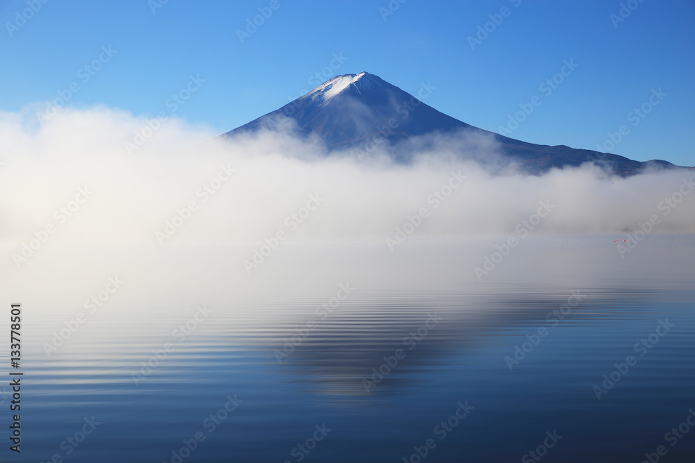 Mt.Fuji and fog reflection on lake Kawaguchiko