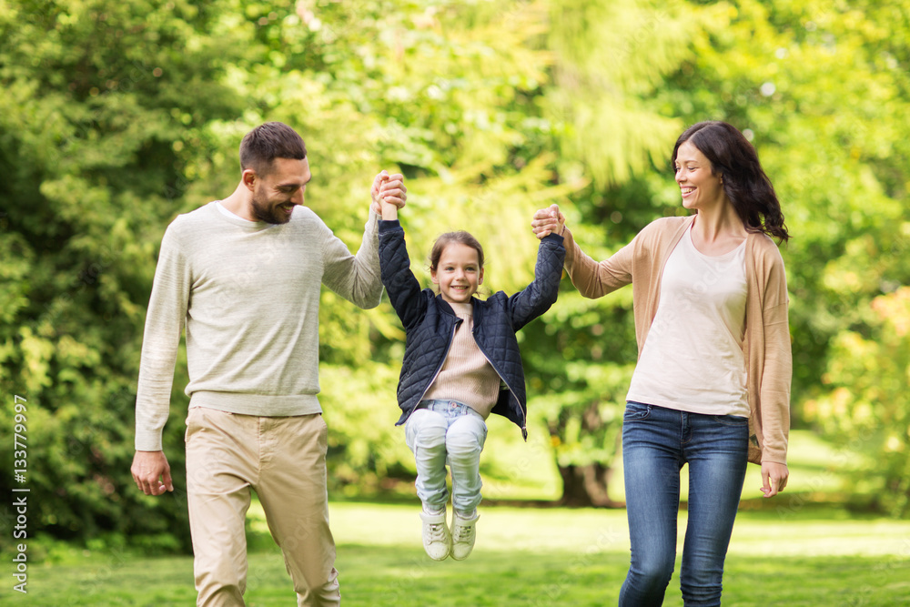 happy family walking in summer park and having fun happy family walking in summer park and having fun