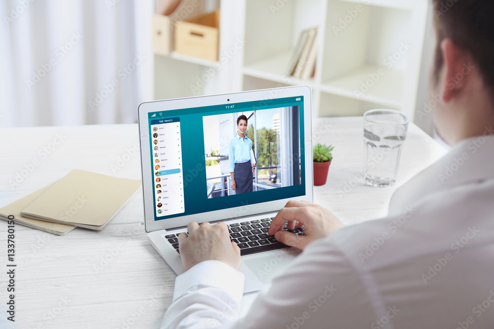 Man video conferencing with lawyer on laptop. Video call and online service concept. Man video conferencing with lawyer on laptop. Video call and online service concept.