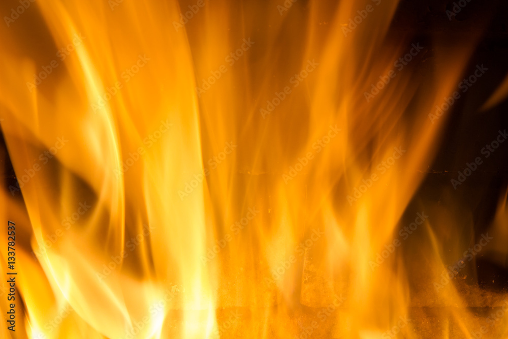 Background on black forks of flames yellow orange and red Background on black forks of flames yellow orange and red