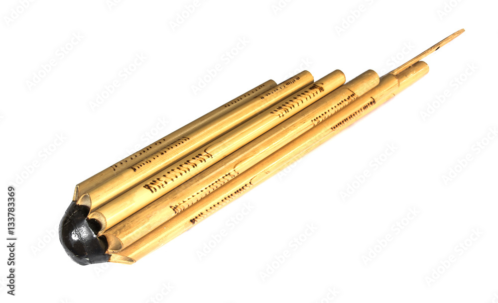 Handmade bamboo flute set for local music in Thailand,closeup shot on white isolated. Handmade bamboo flute set for local music in Thailand,closeup shot on white isolated.