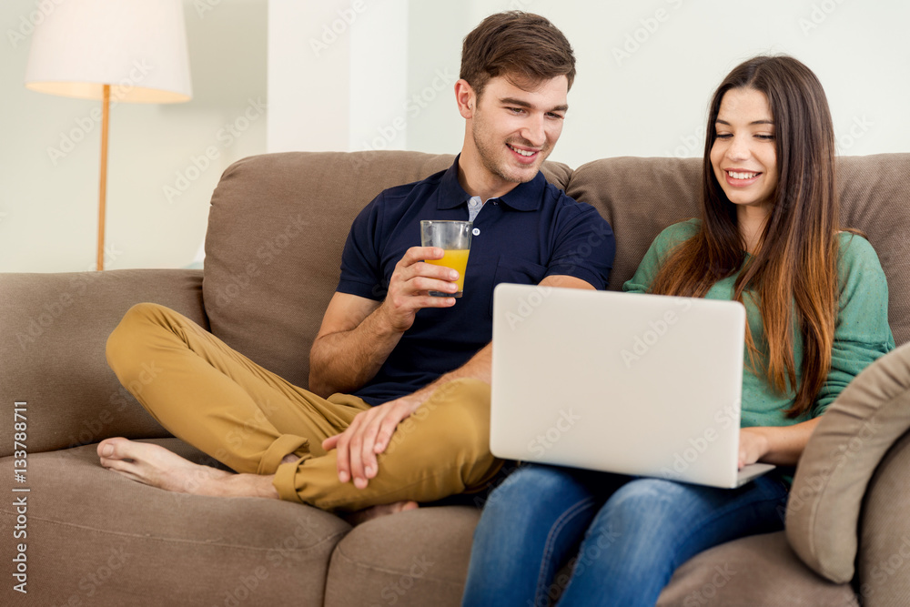 Watching something on a laptop Watching something on a laptop