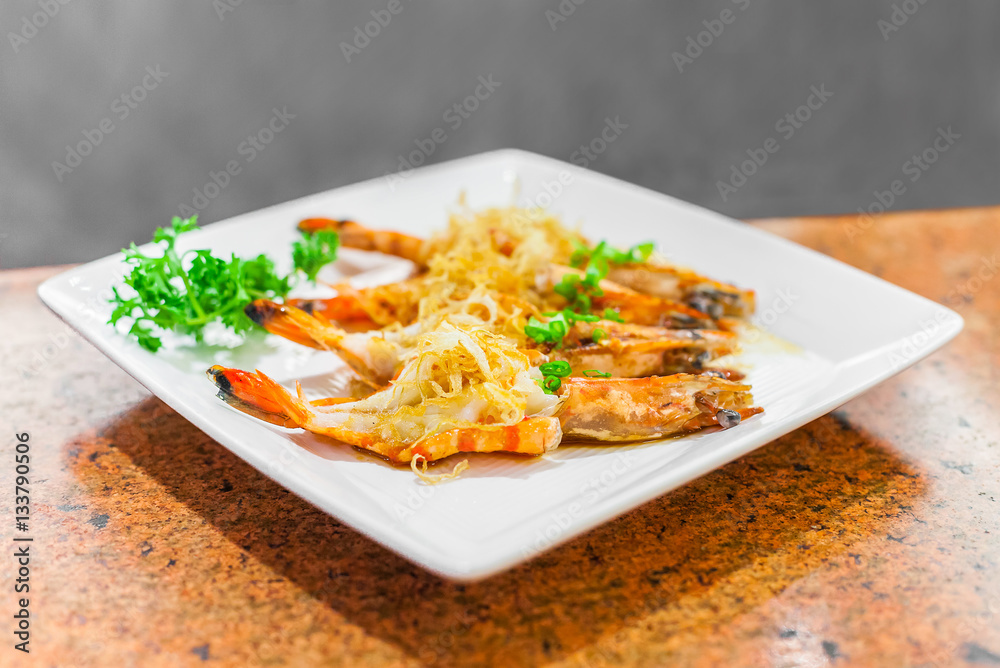 asian seafood fried prawn with garlic, selected focus asian seafood fried prawn with garlic, selected focus