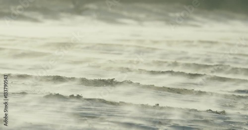 Slow motion close-up of blizzard on beach during a winter storm, RED Dragon 4K 120fps
