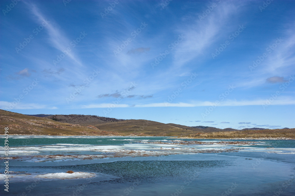 Fototapeta premium Landscape with salt lake and cirrus clouds
