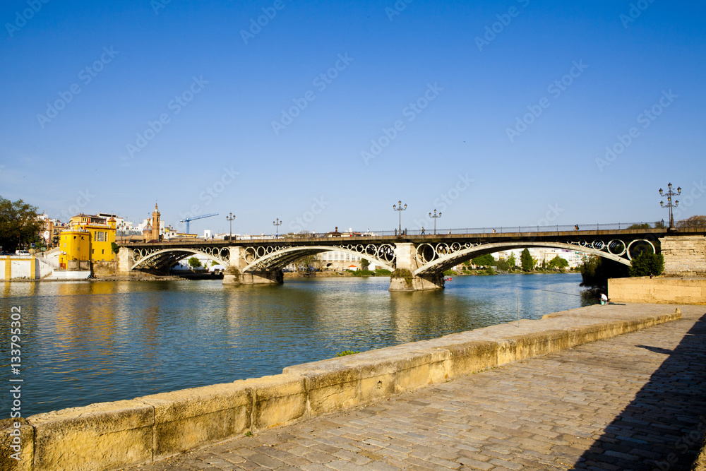 guadalquivir and Triana bridge in Seville, Spain