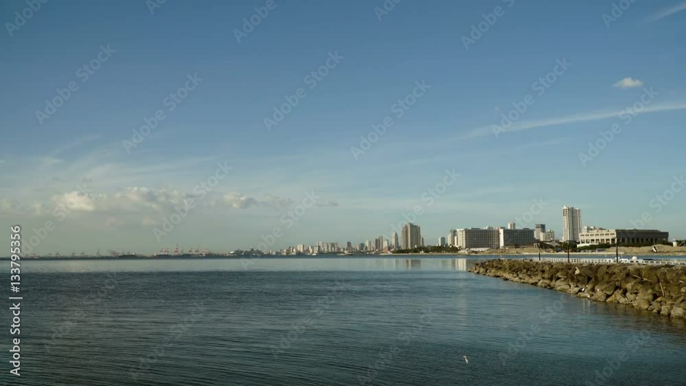 Manila city, skyscrapers and buildings. Seascape coastal city of Manila. Modern city by sea. Makati district. 4K video. Travel concept. Manila city, skyscrapers and buildings. Seascape coastal city of Manila. Modern city by sea. Makati district. 4K video. Travel concept.