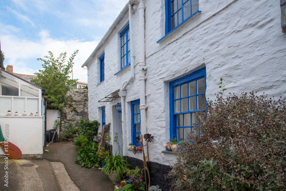 Charming village lane in the picturesque fishing village Port Isaac in north Cornwall. Picture taken from a public street.