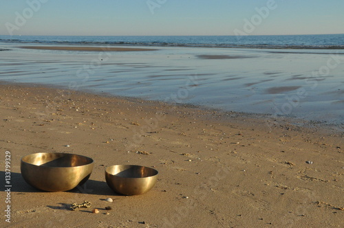 Singing bowl on the beach