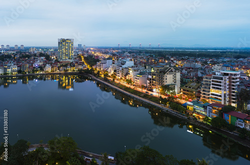 Aerial view of Hanoi skyline at West Lake   Ho Tay in Vietnamese   at twilight