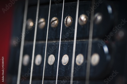 The pickups on the old electric guitar