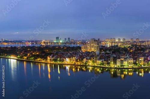 Aerial view of Hanoi skyline at West Lake ( Ho Tay in Vietnamese), at twilight