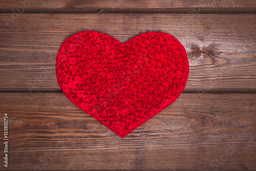  Handmade Heart on the wooden background.Valentines day red heart