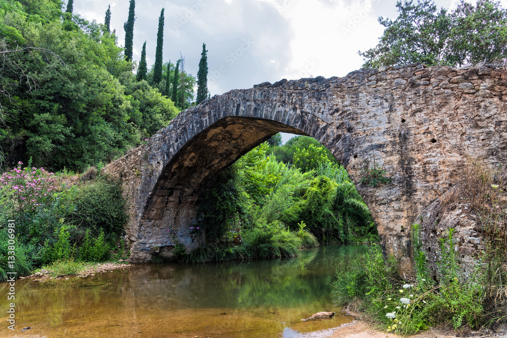 Old stone bridge in Peloponnese, Greece Old stone bridge in Peloponnese, Greece