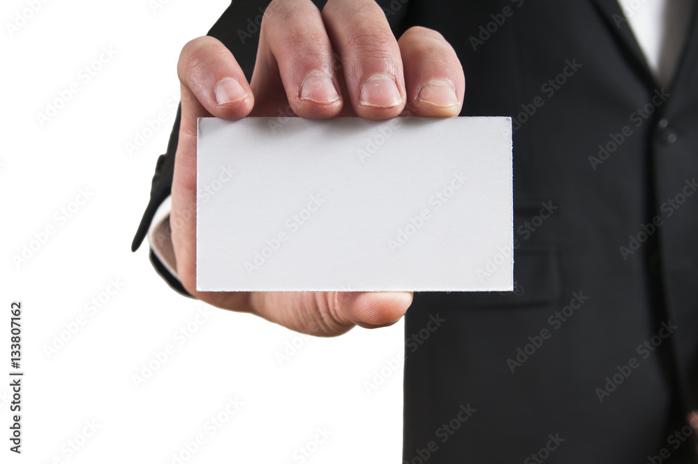 Blank business card in a businessman's hand Blank business card in a businessman's hand