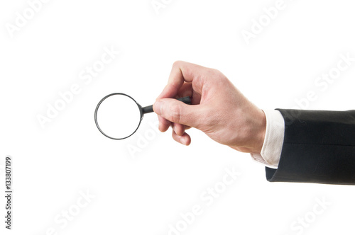 hand holding magnifier glass