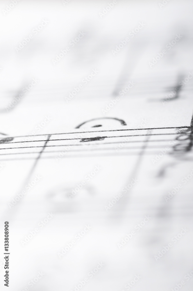 Fototapeta Handwritten musical notes, shallow DOF