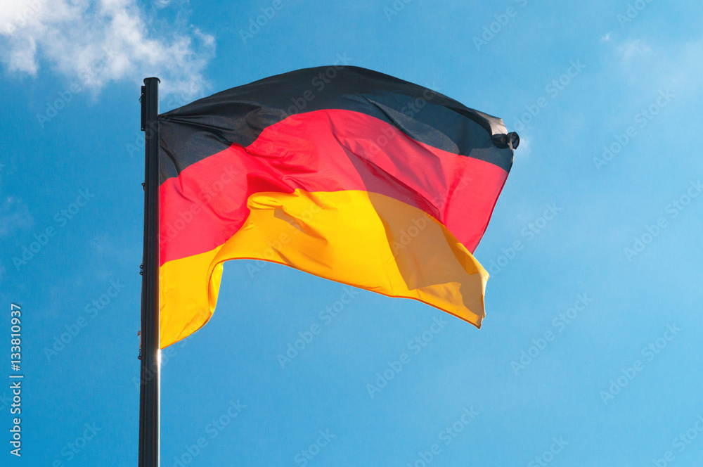 German flag on a background of the sky German flag on a background of the sky