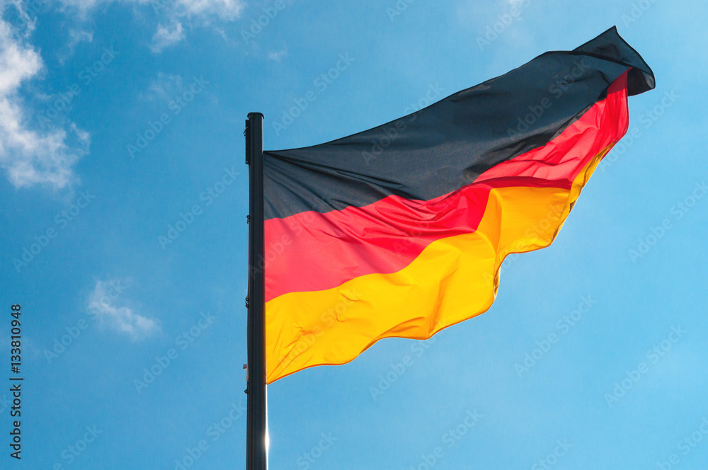 German flag on a background of the sky German flag on a background of the sky