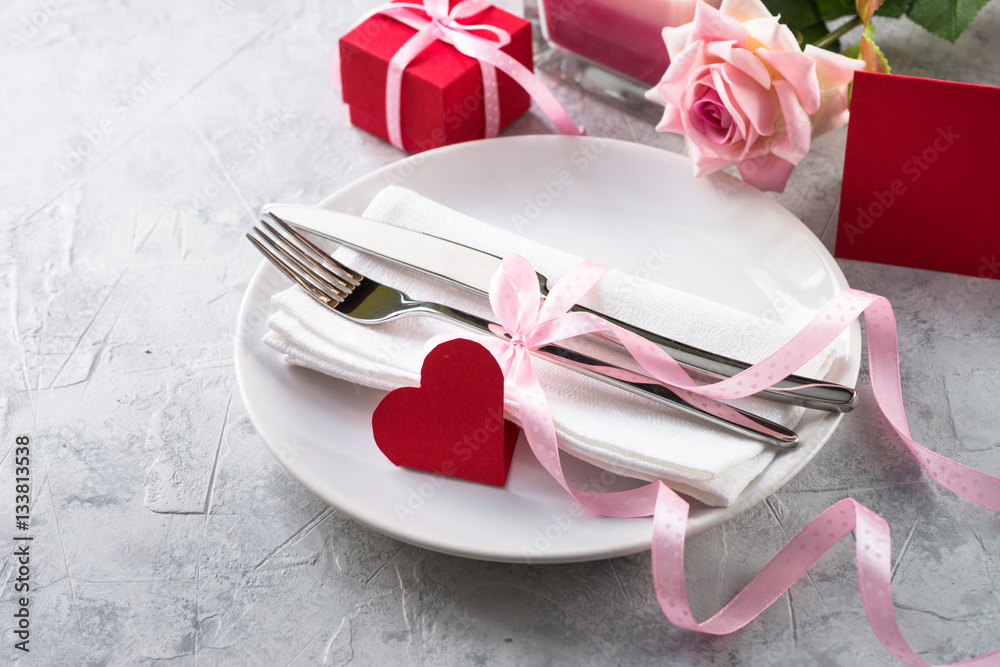 Valentines day table setting. Plate silverware heart decorations flower. Valentines day table setting. Plate silverware heart decorations flower.