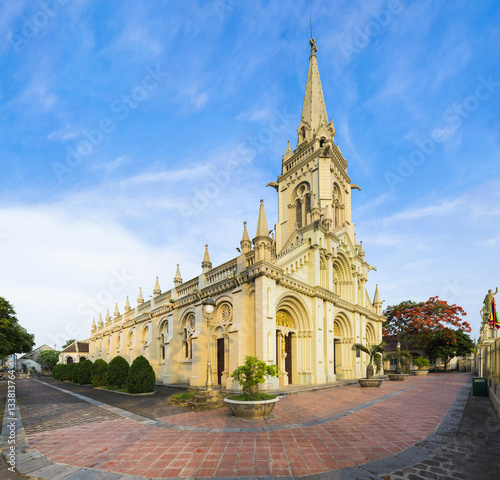 Panorama view of a commune church in Kim Son district, Ninh Binh province, Vietnam. The building is a travel destination for tourist visiting Ninh Binh