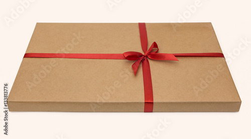 Gift paper box with red ribbon