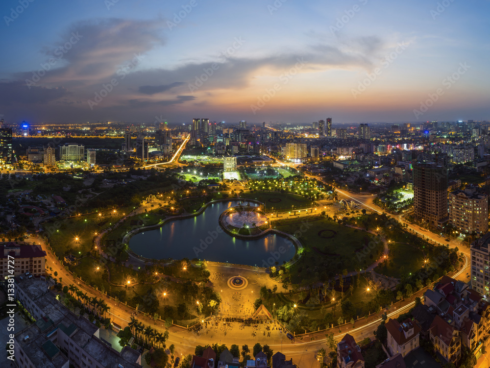 Hanoi cityscape at twilight. Cau Giay park aerial view
