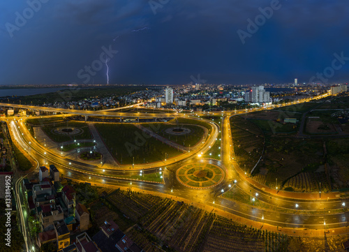Aerial view of skyline city at twilight. Hanoi cityscape at Nhat Tan bridge