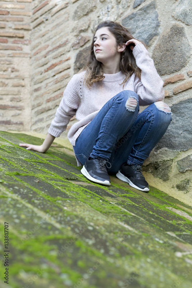 Young woman in old town of Toledo Young woman in old town of Toledo