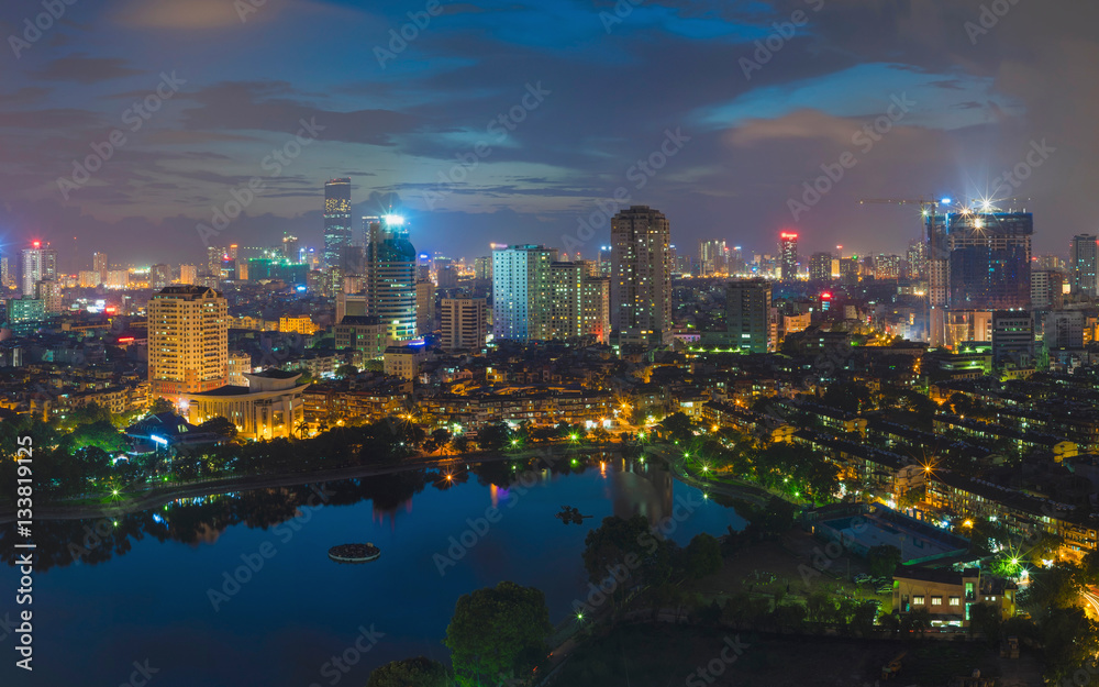 Aerial view of urban skyline at twilight. Hanoi cityscape. Thanh Cong lake view