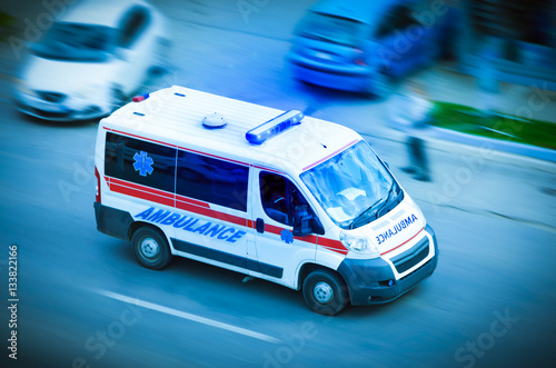 Ambulance van with flashing lights