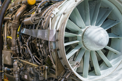 Military fighter Jet engine inside - Airplane gas turbine engine detail - Plane rotor under heavy maintenance.  photo