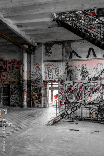 Empty room in abandoned factory ruin photo