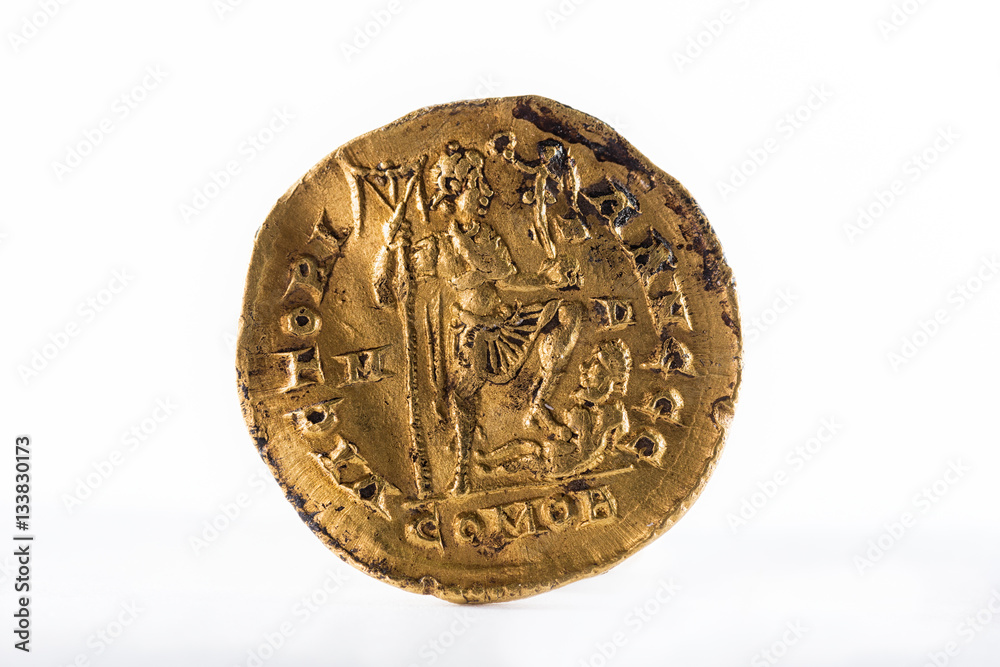 Ancient Roman gold solidus coin of Emperor Honorius. Reverse. Ancient Roman gold solidus coin of Emperor Honorius. Reverse.