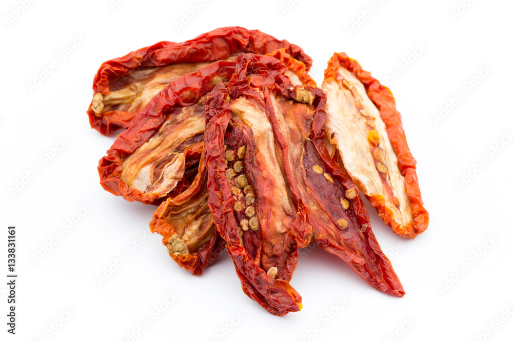 Dried tomatoes isolated on white background. Dried tomatoes isolated on white background.