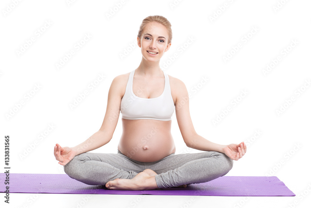 Full Body Portrait Of Pregnant Woman Doing Yoga On a Purple Exercise Mat. isolated on white background Full Body Portrait Of Pregnant Woman Doing Yoga On a Purple Exercise Mat. isolated on white background