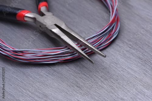 Electrical Tool and Cable on Metal Background with Copy Space