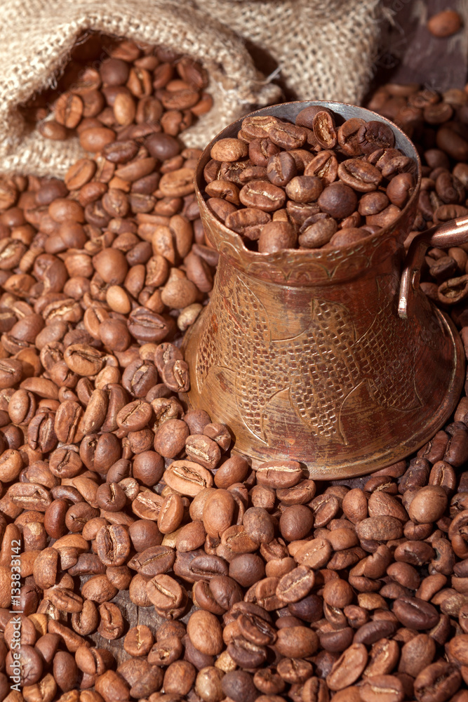 Fototapeta premium Turkish Coffee beans in copper pot .