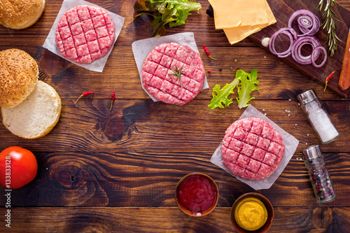 Cutlets For Hamburgers And Spice on a Board